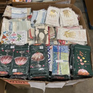 Assorted new name-brand wholesale dish towels in various colors and styles.