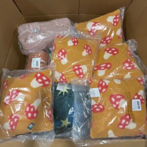 Mixed pallet of new name-brand wholesale bedding, including duvet covers and sheets.