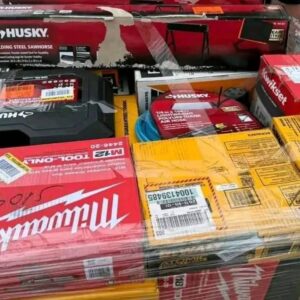 A stacked Home Depot tool pallet filled with Dewalt, Ryobi, Milwaukee tools, ready for wholesale purchase.