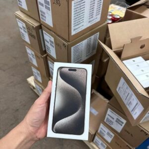 A stacked iPhone 15 pallet with 30 new iPhone 15 Pro Max boxes, all sealed and warrantied.