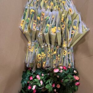 Vibrant new name-brand wholesale sunflower garlands, perfect for cheerful decor and resale.