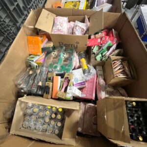 Assorted new name-brand wholesale cosmetics pallet with makeup, skincare, and hair products.