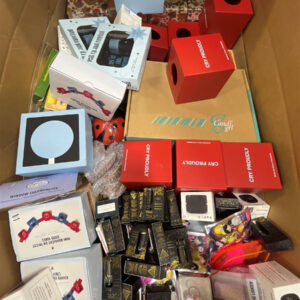 Large pallet filled with various new, name-brand assorted merchandise items for resale