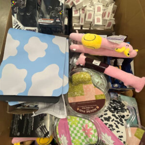 Assorted new name-brand tech accessories liquidation pallet, including cases, chargers, and headphones.