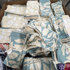 Assorted new name-brand wholesale dish towels in various colors and styles