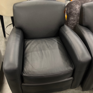 Luxurious Mitchell Gold Bob Williams leather chair in a neutral tone, showcasing fine craftsmanship and elegant design, ideal for a high-end living space or office, available in a liquidation pallet.
