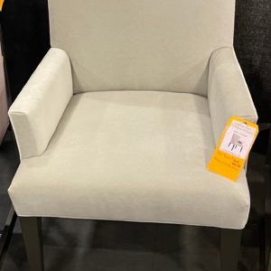 Luxurious Mitchell Gold + Bob Williams armchair liquidation, a tall, elegant, upholstered seating option.