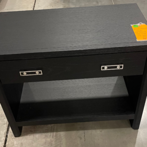 Elegant Mitchell Gold Bob Williams side table with a single drawer, luxury furniture liquidation.