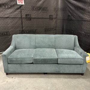 Elegant Mitchell Gold sleeper sofa in a living room setting, showcasing luxury and comfort.