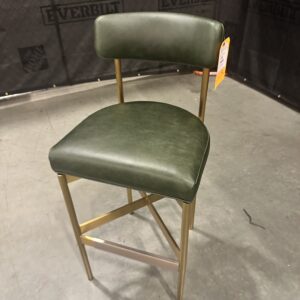 Luxurious Mitchell Gold Bob Williams bar stool liquidation, featuring a sleek leather design with elegant stitching.