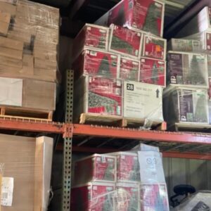 A pallet load of 25 pre-lit Christmas pine trees, ready for holiday sales.