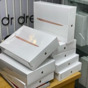 A pallet stacked with 10 brand new Apple MacBook Air 2020 boxes, ready for bulk macbook pallets liquidation.