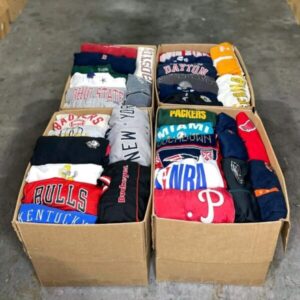 Large stack of men's and women's brand new clothing pallets wholesale, neatly packaged