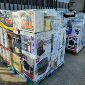 A large pallet stacked high with various boxed and unboxed mixed electronic items for bulk liquidation sales.