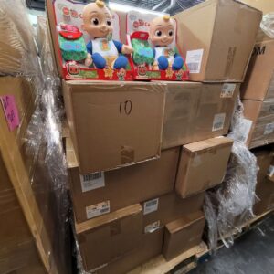 A diverse assortment of colorful toys overflowing from a large wholesale toy pallet, ready for resale.