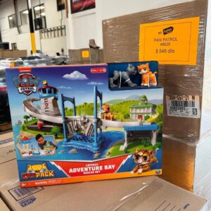 Pallet of new Paw Patrol Chase Toy sets, featuring the Rescue Wheels truck and action figure, ready for wholesale liquidation.