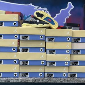 A diverse collection of 30 pairs of wholesale Jordan shoes neatly stacked on a pallet, ready for shipment.