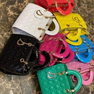 A diverse collection of designer and popular brand handbags in a wholesale handbags pallet